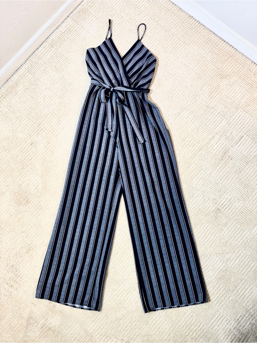 Striped Black, Gray, White faux wrap Jumpsuit, waist tie, wide legs.
